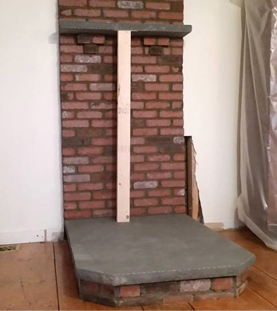 Greenville NY Wood stove installation Mantel and brick wall complete